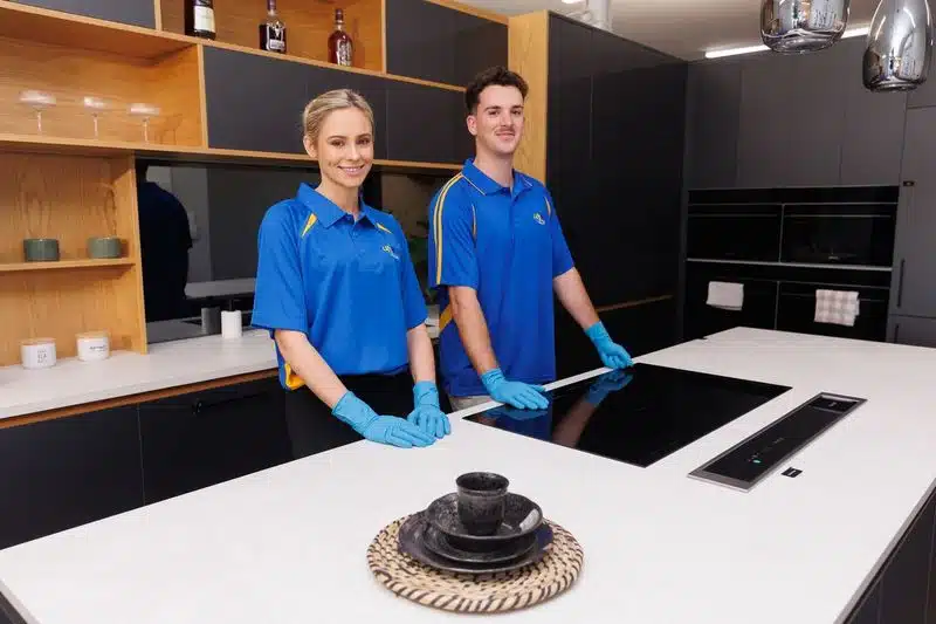 Professional workers wearing blue uniforms and blue gloves