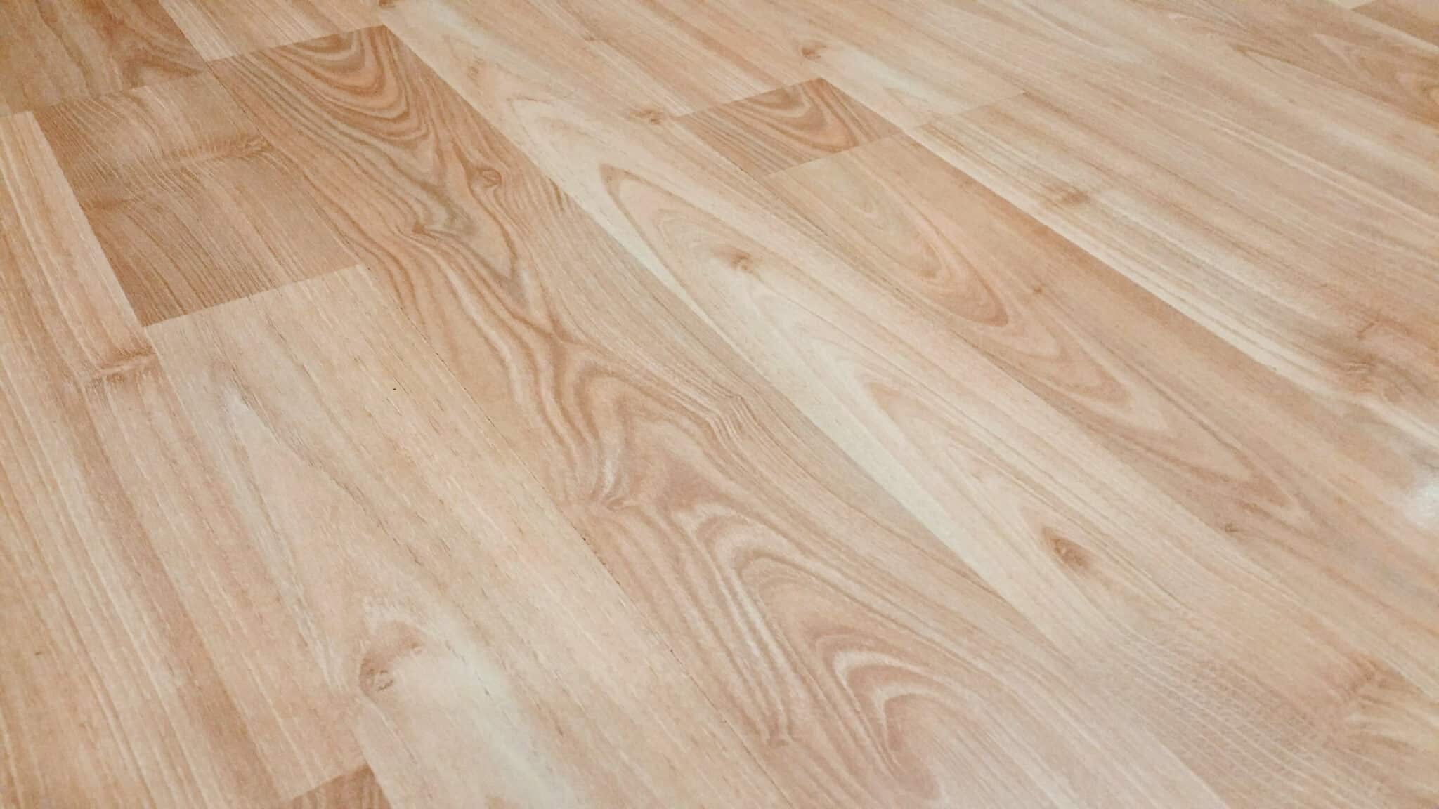 Light wood flooring with natural grain patterns.